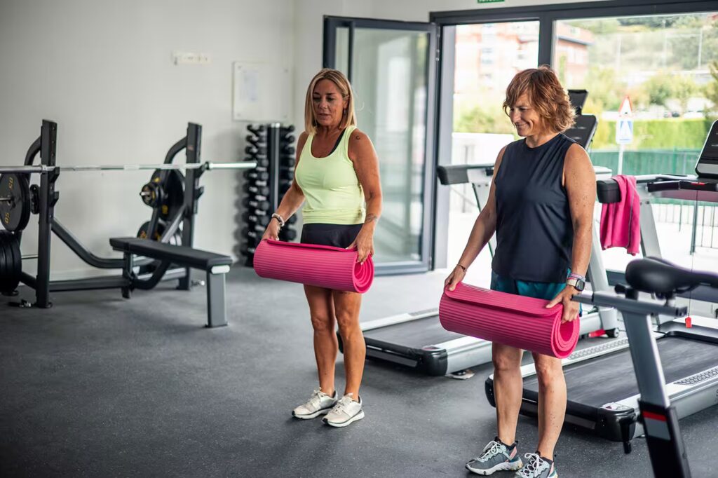 two elderly women in sportswear preparing to lay y 2025 04 27 14 25 37 utc compressed converted